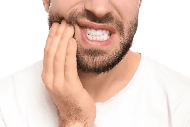 Pessoa precisando de remédio para dor de dente