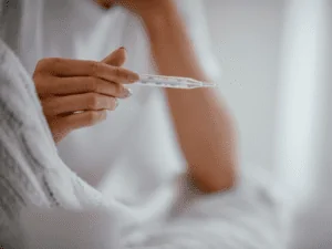 Pessoa com febre por conta da dengue