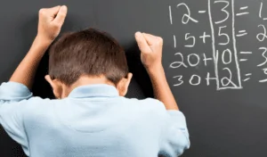 Criança com dificuldade de entender os números por conta da discalculia