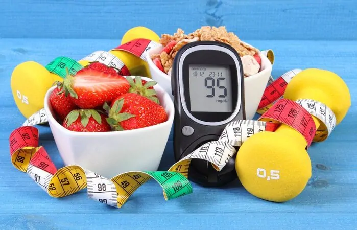 Medidor de diabetes com alimentos saudáveis pra manter a diabetes tipo 2 no controle