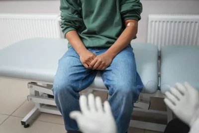 Homem em consulta médica